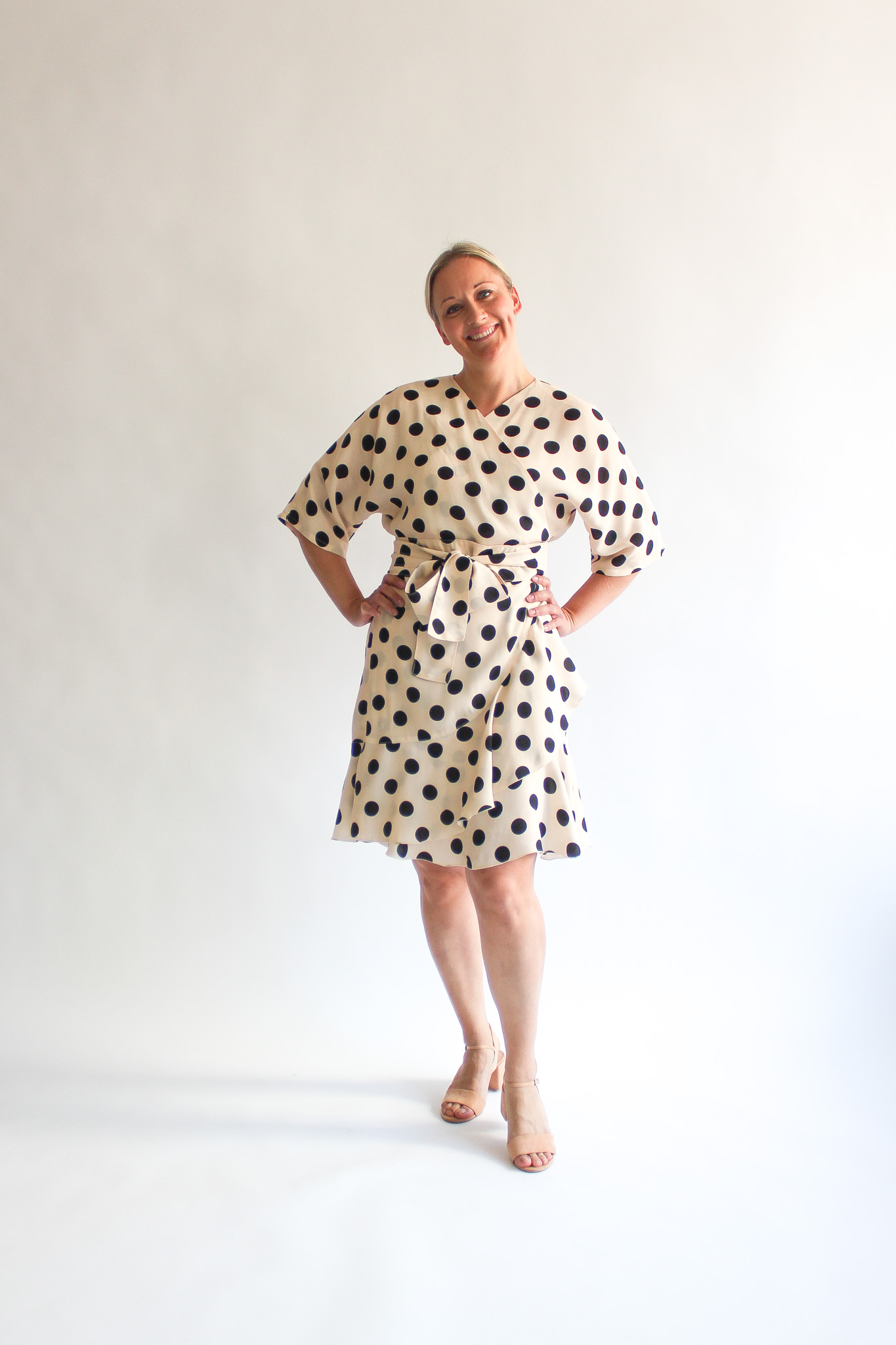A pois crema e nero viscose mini frill wrap dress