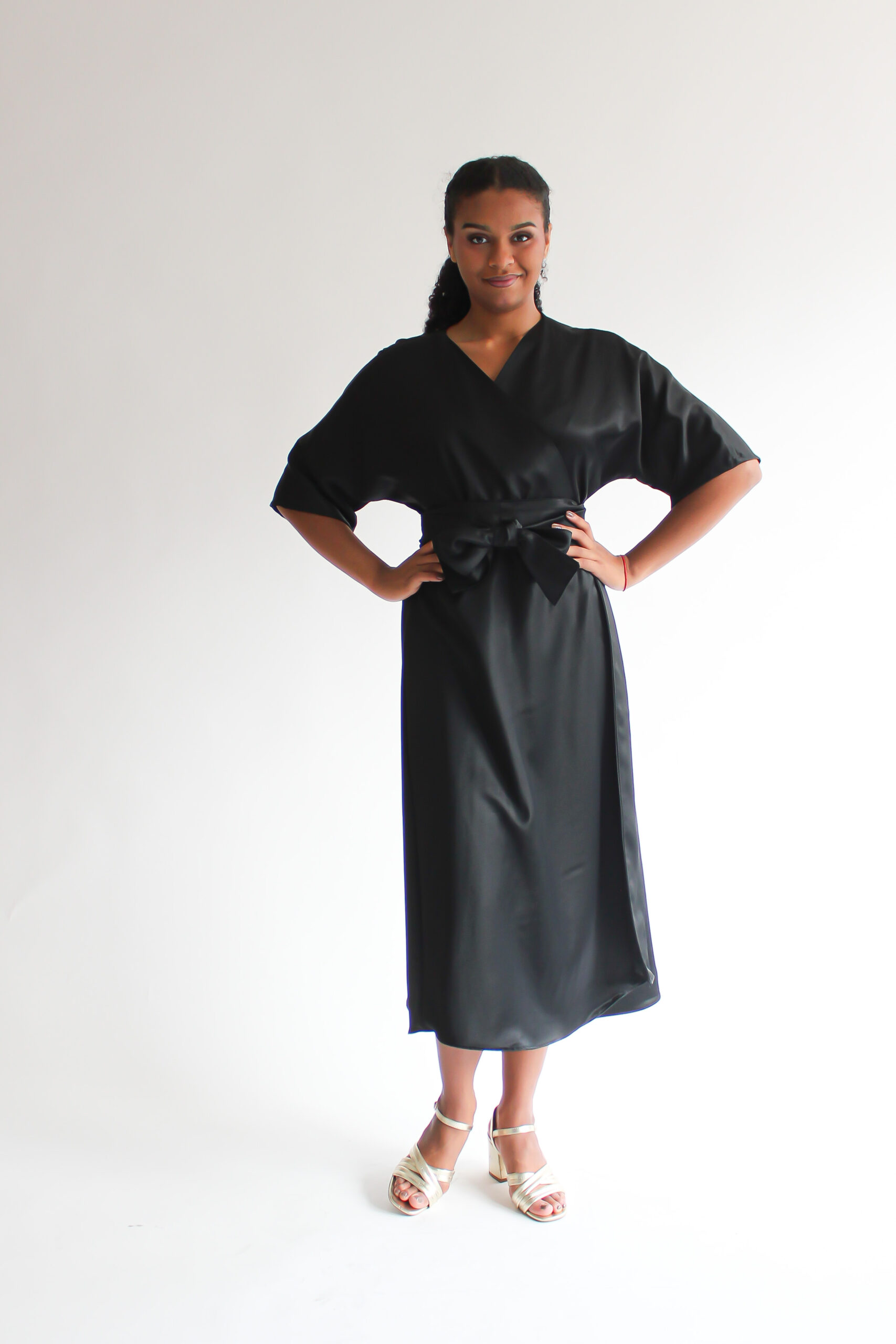 Nero lucido wool-viscose midi wrap dress